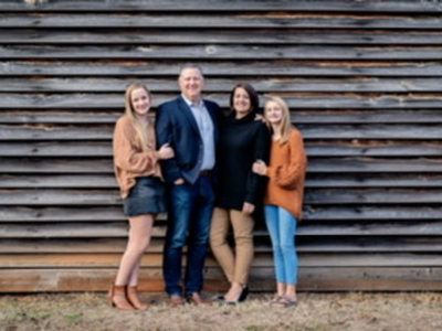 Principal Maria Clark and family