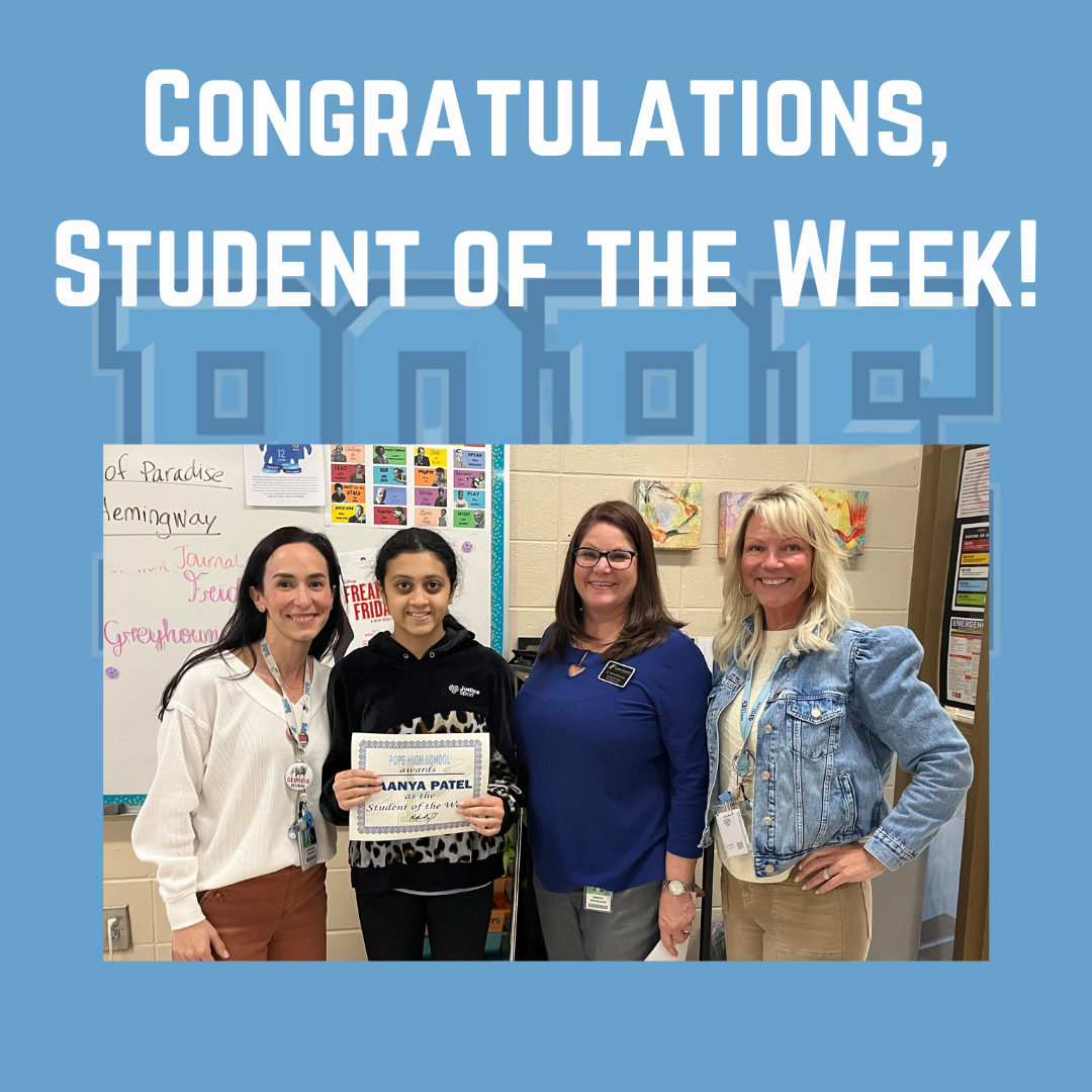 Student of the week with principal and teacher