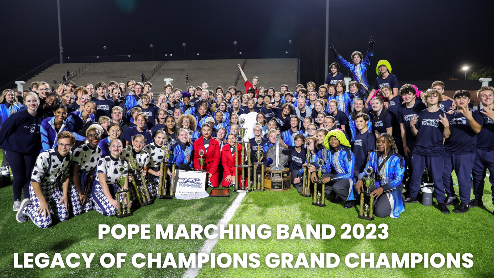 Pope 2023 marching band group photo with trophy