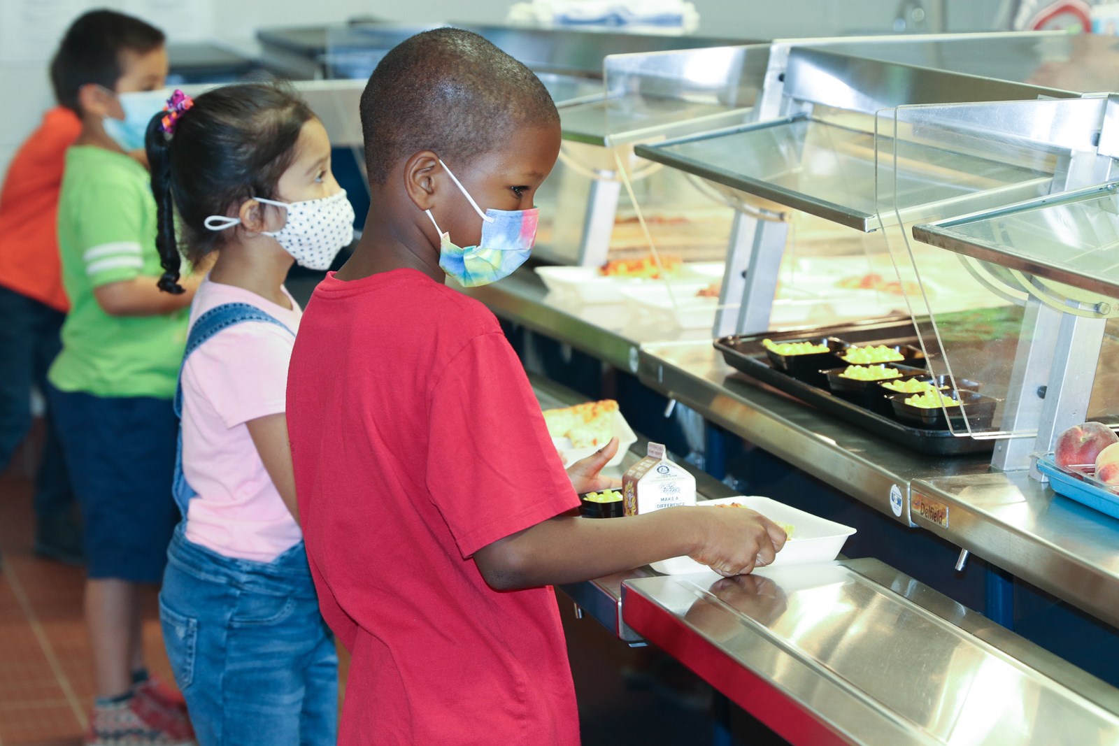 Students pick up lunch during summer learning program at Clarkdale Elementary School-16.jpg