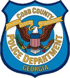 Cobb County Police Department badge.