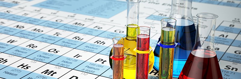 Beakers on the Table of Elements.