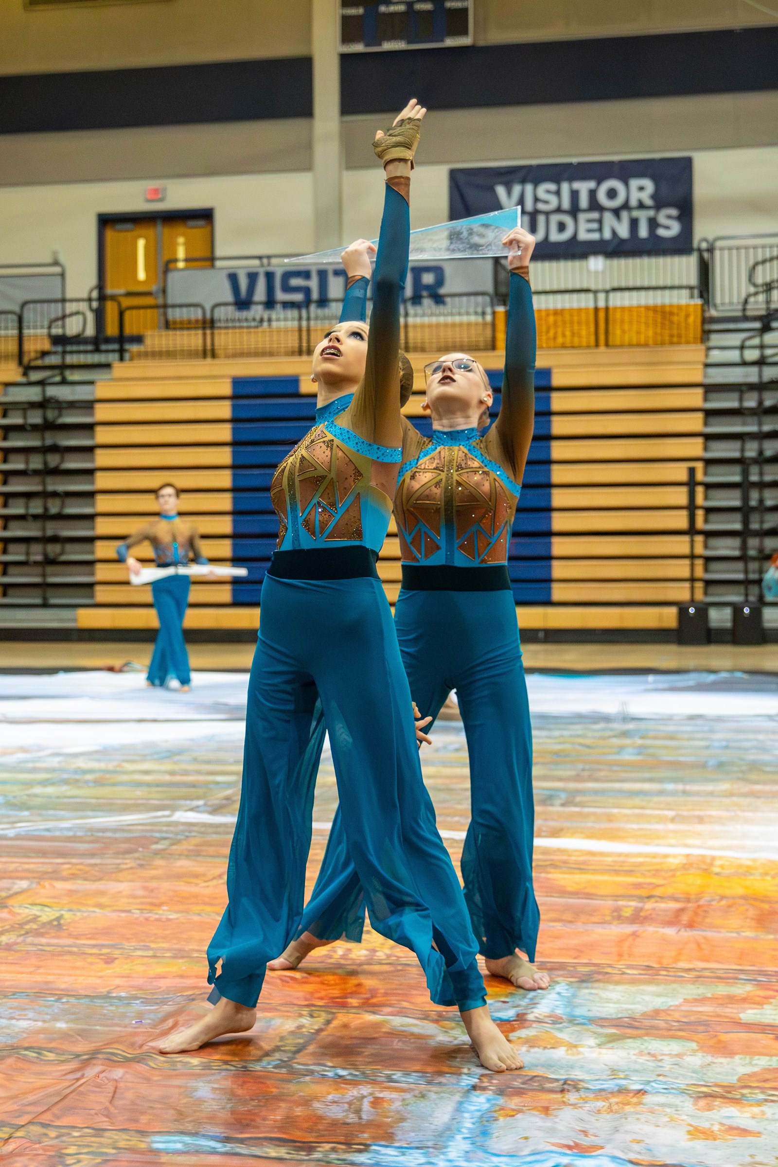 two color guard members pointing