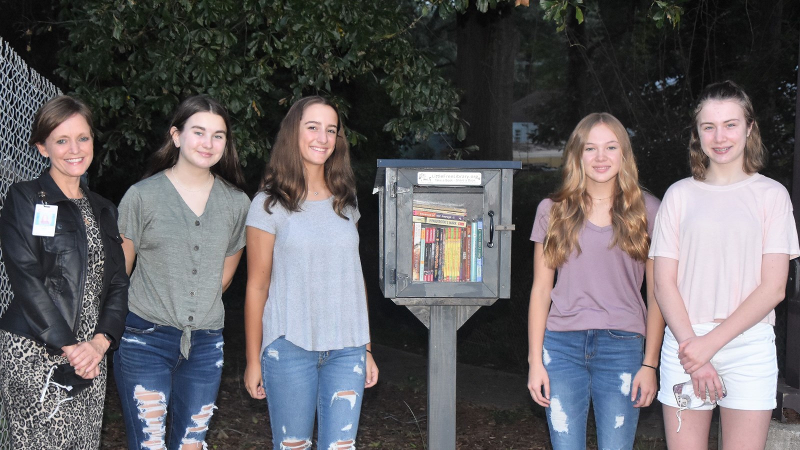 Pope High School students open Little Free Library at Green Acres Elementary