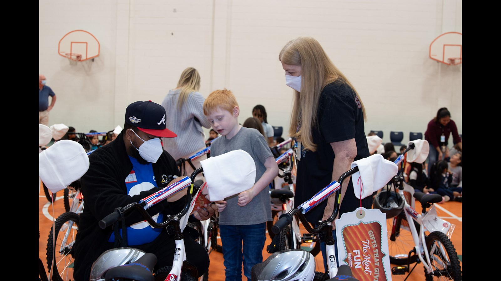 Season of Giving Continues: Academy Sports Gives 100 Bikes to Green Acres  Students, Omni Hotels Surprises a Teacher, Principal