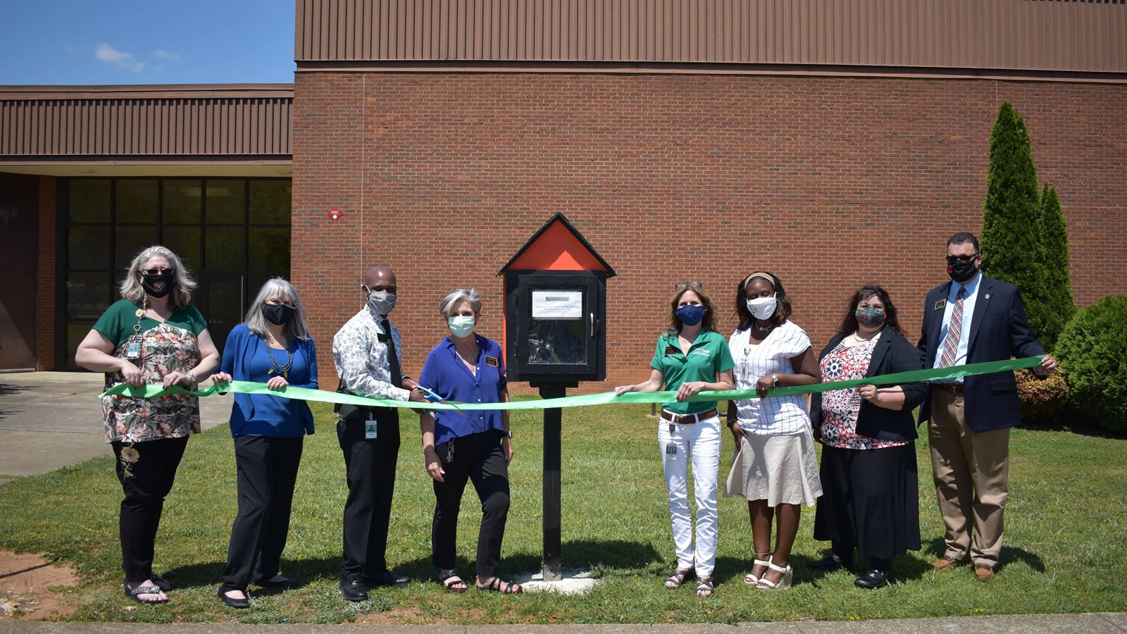 Tapp Community Cuts Ribbon on Little Library