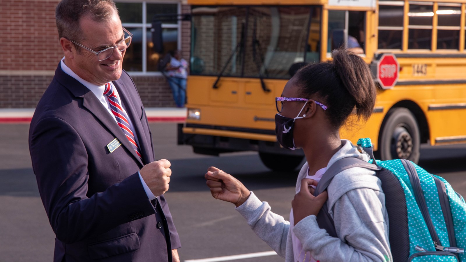 Principal Dean Yoder welcomes students to the new Pearson Middle School