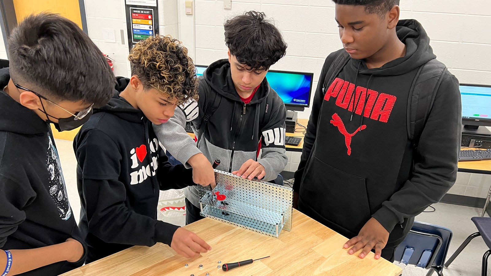 Garrett Middle Schools work in their 8th grade robotics class.